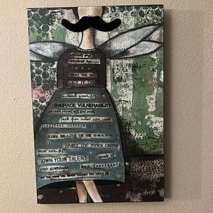 “Let it go” wall art by Kelly Rae Roberts.